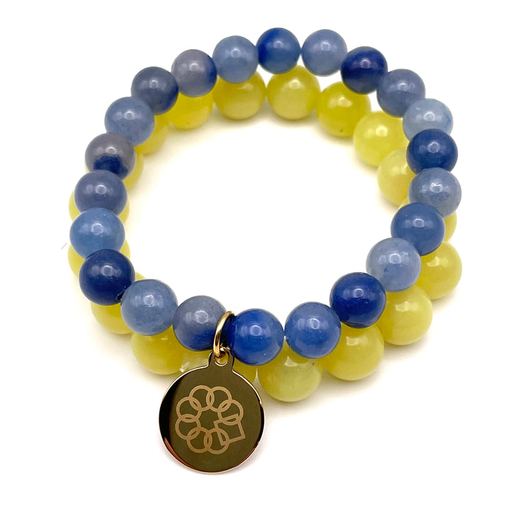 Designed to Be Kind® Embrace The Difference® SUPPORT FOR UKRAINE Stretch Bracelet Set.